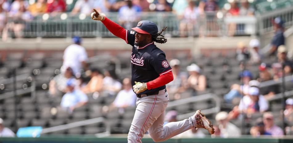 Los Nacionales cortan racha de 10 victorias de los Bravos derrotándolos 4-3; Marcell Ozuna da jonrón